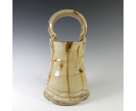 Takeshi Yasuda (Japanese b. 1943) a studio pottery stoneware Bucket, with light honey glaze and manganese splashes, marks to 