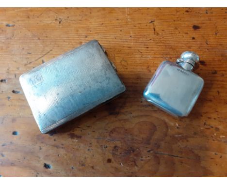 A small plain silver hip flask Birmingham 1903 2oz together with a silver engine turned cigarette case Birmingham 1931  5.8oz