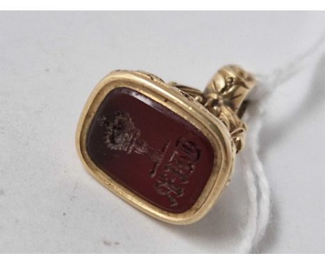 A Victorian gold seal with carnelian crown intaglio