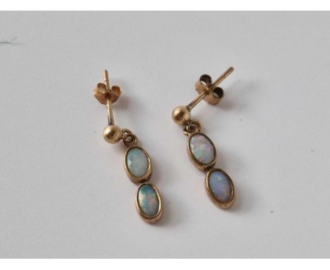 A pair of opal drop earrings 9ct