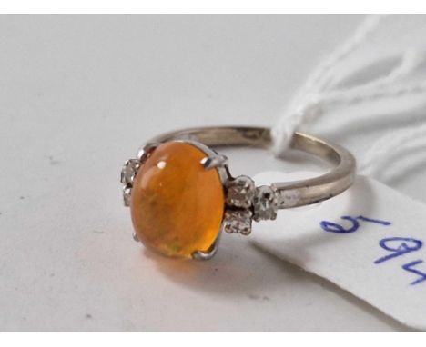 A PLATINUM DIAMOND AND OPAL RING SIZE J