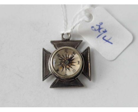 A silver compass fob