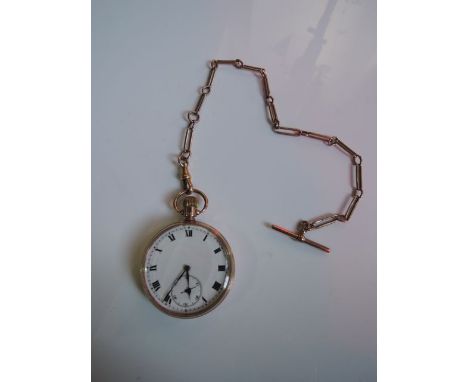 A 9ct rose gold open-faced pocket watch, the white enamelled dial with black Roman numerals, subsidiary dial for seconds, pla