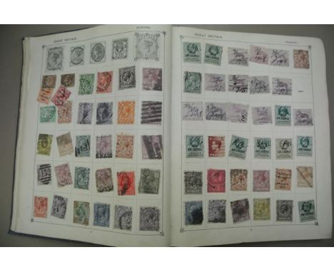 A Strand stamp album containing a selection of stamps from the Victorian period, George V, Edward VIII, etc together with oth