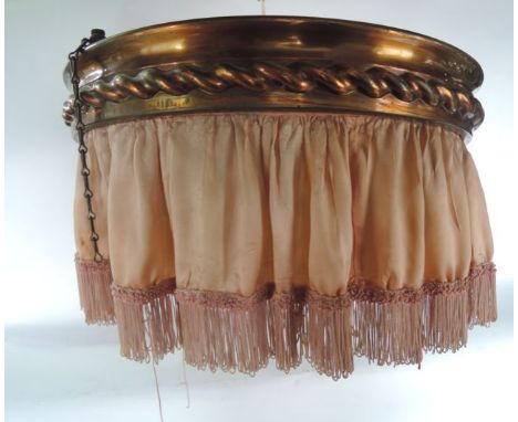 An Edwardian anodised hanging ceiling light of hooped form with rope twist detail and material fringe