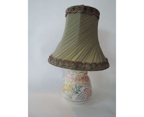 A Poole Pottery lamp base with painted spring flower decoration and impressed mark to base 805A