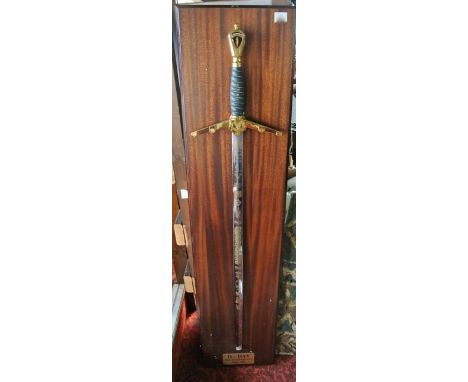 A commemorative sword marking the 50th anniversary of D-Day 1944-1994, the blade inscribed Wilkinson Sword Made In England be