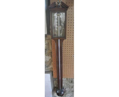 A Georgian walnut stick barometer with moulded detail, the rectangular dial set beneath an open architectural pediment