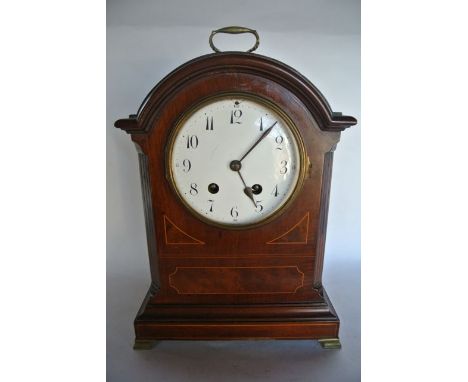 An Edwardian mahogany and inlaid bracket clock in the Georgian taste with converse enamelled dial with 8 day gong striking mo