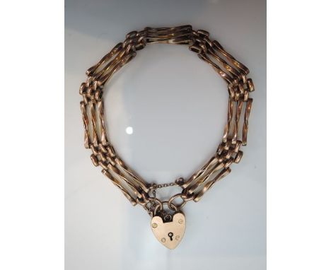 A 9ct rose gold gate-link bracelet, with heart-shaped padlock clasp, 10.8g
