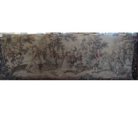 A machine woven tapestry showing an 18th century French parkland scene with musicians, dancers, painter, etc