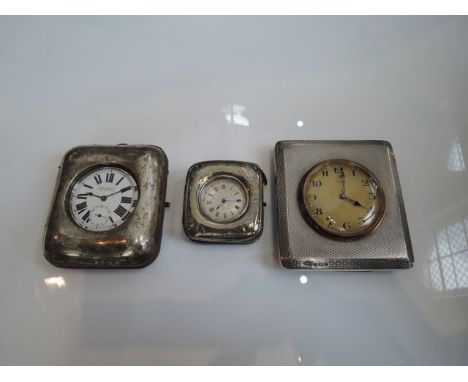 A silver open-faced pocket watch, 935 standard, the textured silvered dial applied with gilt Roman numerals, within a gilt fl