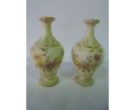 A pair of 19th century Grainger Worcester vases with painted and gilded floral decoration on a cream coloured ground, with fu