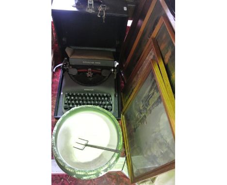 A vintage cased Remington typewriter,  a ceramic jardinière, a 19th century oak drinks tray with turned timber and plated han