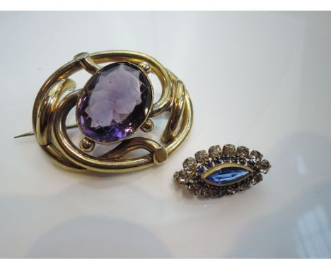 A Victorian pinchbeck lovers knot brooch, centred with an amethyst coloured stone; and a late Victorian paste brooch, the nav