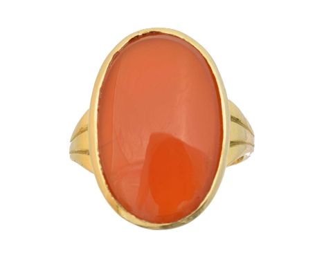 An 18ct gold carnelian ring, the oval carnelian with tapered shoulders, Swedish assay marks, ring size N1/2, gross weight 8.2