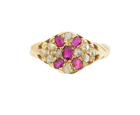 An 18ct gold ruby and diamond dress ring, the cushion cut ruby and rose cut diamond cluster with tapered shoulders, ring size