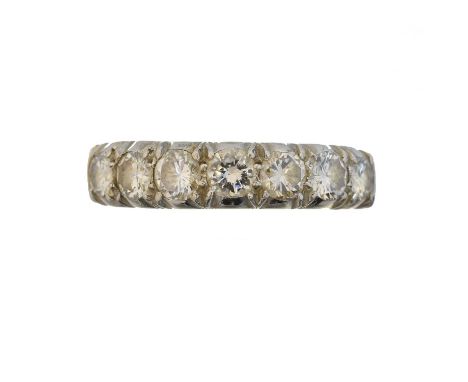 A diamond seven stone ring, the brilliant cut diamond line with tapered shoulders, estimated total diamond weight 1.05cts, es