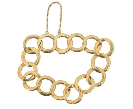 A 9ct gold bracelet, the fancy curb link chain with partially concealed hinged clasp, hallmarks for Birmingham, length 19cm, 