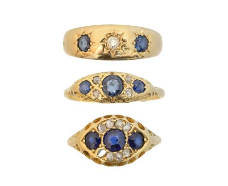 Three 18ct gold sapphire and diamond dress rings, to include a sapphire and diamond three stone ring and two dress rings, rin