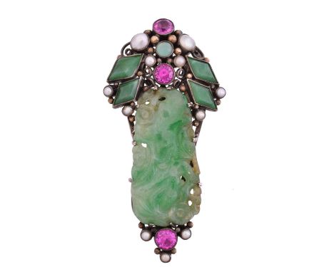 A jade and gem-set silver clip brooch attributed to Dorrie Nossiter, circa 1920, of bicolour design, the jade carving depicti