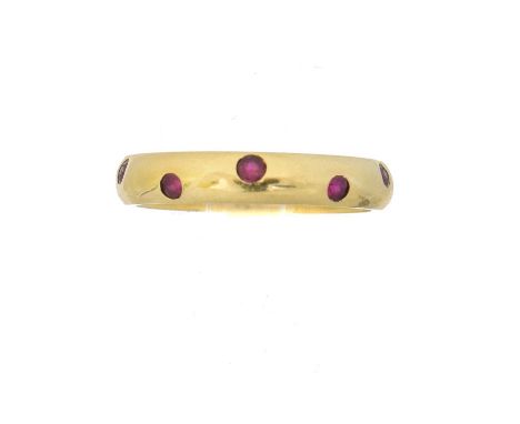 An 18ct gold ruby Etoile ring by Tiffany &amp; Co., the polished band set with ten circular shape rubies, signed Tiffany &amp