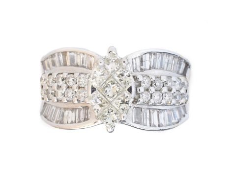 A diamond cluster ring, the square and fancy shape diamond cluster with brilliant and baguette cut diamond shoulders, stamped