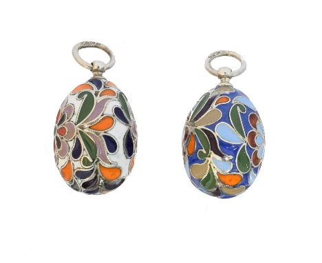 Two silver enamel egg pendants, of floral design, Russian marks, lengths 3.1cm, gross weight 10.2g.Overall condition good to 