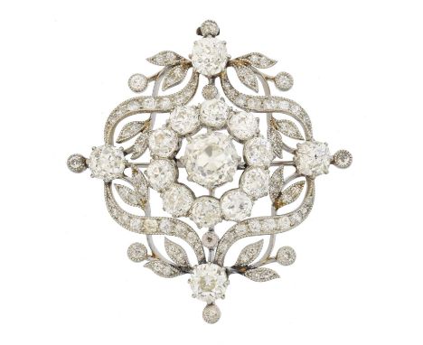 An early 20th century diamond brooch, the principal old cut diamond weighing approx. 1.60cts within a similarly cut diamond f