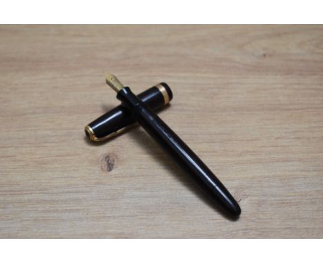 A Parker Duofold button fill fountain pen in chocolate brown with decorative band to the cap having Parker Duofold 14k N nib