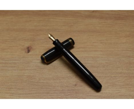 A Parker Deluxe Challenger button fill fountain pen in black with three narrow bands to the cap having Parker Fountain Pen 14