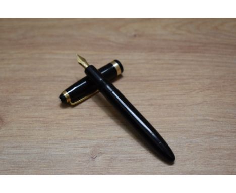 A Montblanc 202 button fill fountain pen in black with broad cap band having a 14 Karat 2 nib