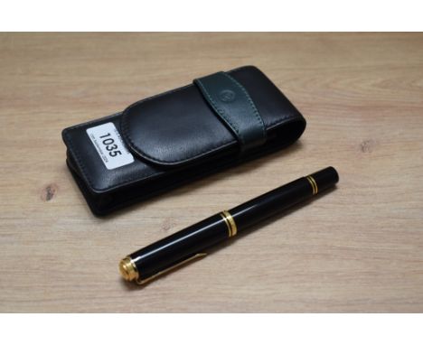 A Pelikan M800 roller ball pen in black. In soft case