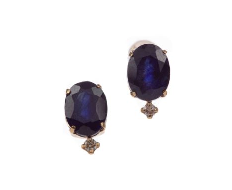 PAIR OF SAPPHIRE AND DIAMOND STUD EARRINGS, set with oval sapphires above a round brilliant cut diamond, the diamonds totalli