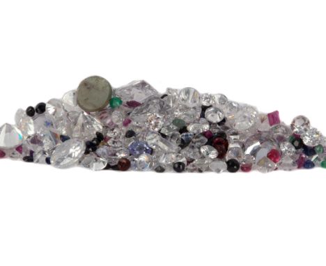 **COLLECTION OF UNMOUNTED STONES, including emerald, ruby and sapphire, weighing approximately 82.91 carats