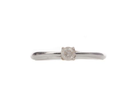 DIAMOND SOLITAIRE RING, set with a round brilliant cut diamond of approximately 0.15 carats, in nine carat white gold, size K