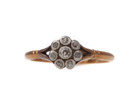 DIAMOND CLUSTER RING, the old cut diamonds totalling approximately 0.12 carats, marked 18CT, size K 1/2, 2.1g