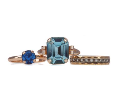 NINE CARAT GOLD GEM SET BAND, size K 1/2, 1.8g, along with two yellow metal gem set rings (3)