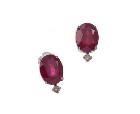 PAIR OF RUBY AND DIAMOND STUD EARRINGS, set with oval rubies above round brilliant cut diamonds, the diamonds totalling appro