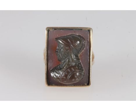 Victorian yellow metal and hardstone cameo ring, the gem raised with portrait of a classical Greek soldier, ring size N/O.