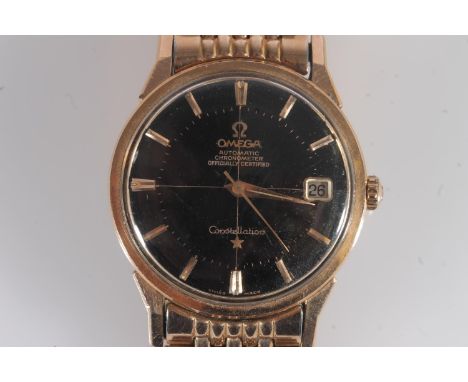 Omega Constellation Automatic Chronometer wristwatch, black dial with date aperture at 3 o'clock, gold coloured Dauphine hand