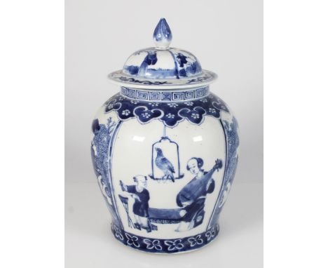 19th century Chinese blue and white jar and cover, the domed lid with teardrop finial, decorated with figures playing musical