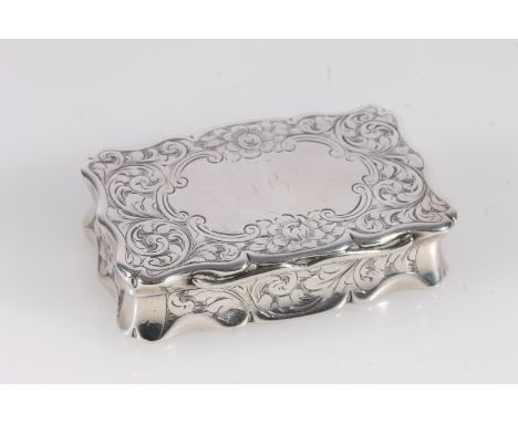 Antique Victorian silver snuff box of rectangular shape with serpentine edge, the body incised with sinuous design all over a