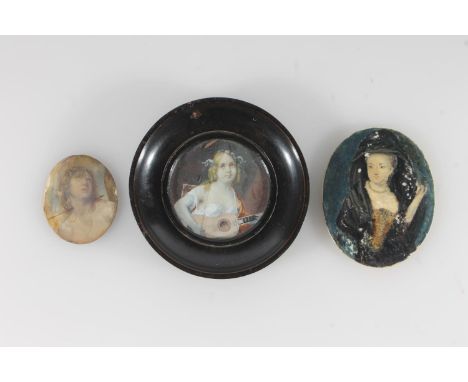 Three ivory portrait miniatures to include a circular portrait of a young girl with ukulele, frame 10.5cmn diameter, oval por