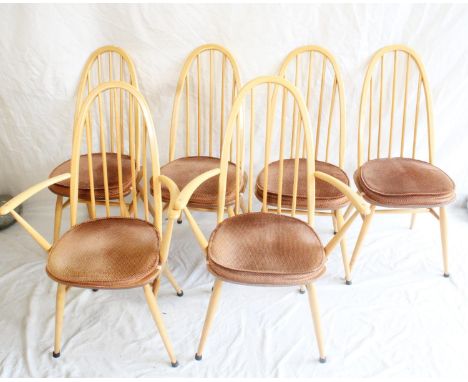 Set of four Ercol light elm Windsor quaker stick back dining chairs together with two matching carvers, H99cm. Condition repo