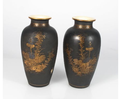 Pair of Japanese Satsuma ceramic vases, black and gilt decoration depicting butterflies and flowering plants, 15cm. Condition