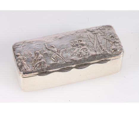 Antique Edwardian silver table snuff box of rectangular shape, the lid decorated in repoussé with a scene of figures dancing 