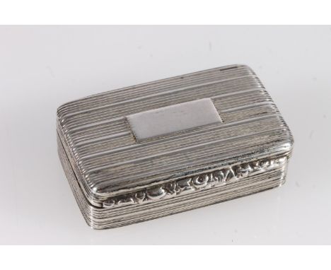 Antique William IV silver snuff box of rectangular shape with all over reeded decoration, the thumb piece with relief floral 