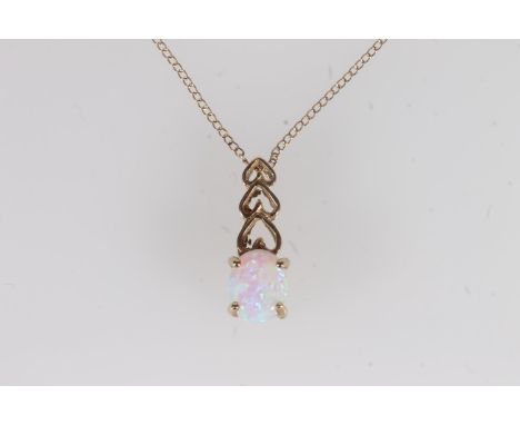 9ct gold and opal pendant, the oval cabochon cut white opal claw set under a triple inverted heart shape frame, suspended on 