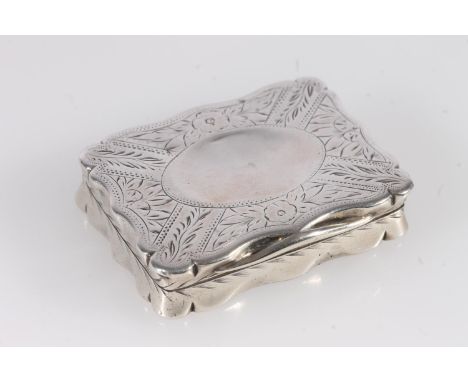 Antique Victorian silver snuff box of rectangular shape with serpentine edge having incised floral design and plain oval cart